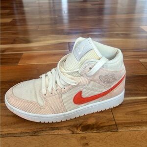 Nike High-Top Sneakers with Red Swoosh